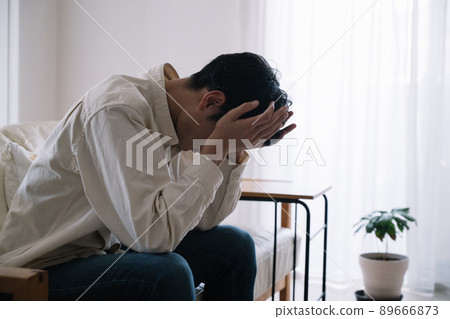 Image of a worried man in his thirties Image of a worried man in his thirties 89666873