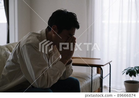 Image of a worried man in his thirties Image of a worried man in his thirties 89666874