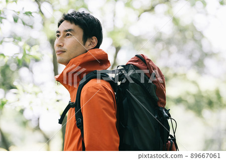 Image of a man climbing, hiking, or walking Image of a man climbing, hiking, or walking 89667061