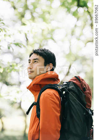Image of a man climbing, hiking, or walking Image of a man climbing, hiking, or walking 89667062