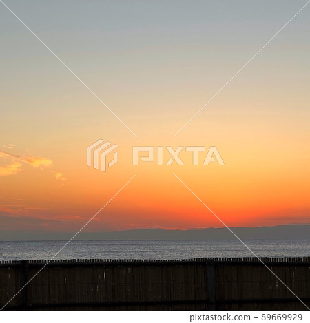 Landscape with visible horizon, sunset from the coast, sunset sky, sea and sunset, sunset sky, orange sky, blue sea 89669929
