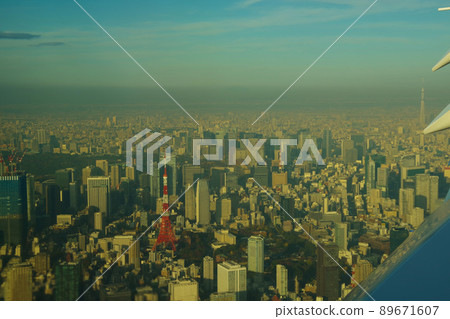 Tokyo Tower and Sky Tree Tokyo city center aerial photograph Aircraft window scenery Tokyo cityscape from the airplane window 89671607