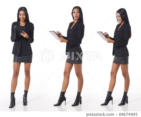 Full length Figure snap of 20s Asian Woman black long straight hair suit short skirt and high heel Full length Figure snap of 20s Asian Woman black long straight hair suit short skirt and high heel 89674995