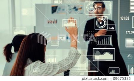 Business people in corporate staff meeting with envisional graphic 89675385