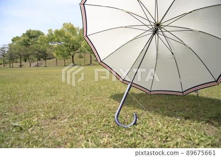 UV protection with a parasol when going out UV protection with a parasol when going out 89675661