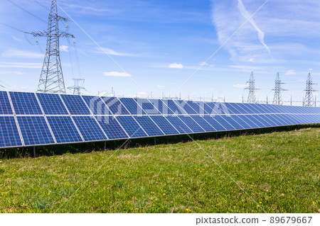 Solar panels, high voltage electricity towers, and transmission power lines 89679667
