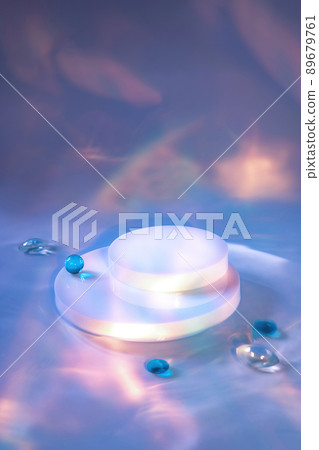 empty scene with cylinder podium on holographic background empty scene with cylinder podium on holographic background 89679761