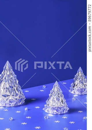 Winter scene with Christmas decorations on purple blue background Winter scene with Christmas decorations on purple blue background 89679772