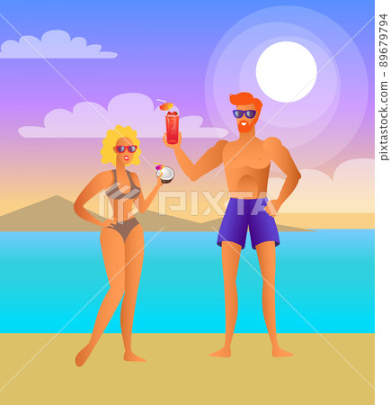 Man and Woman on Beach at Night with Cocktails 89679794