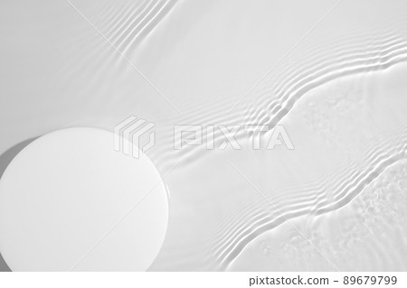 Empty white circle podium on transparent clear water background with copy space Empty white circle podium on transparent clear water background with copy space 89679799