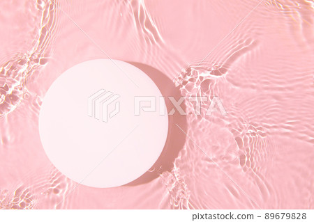 Empty white circle podium on transparent pink clear water background Empty white circle podium on transparent pink clear water background 89679828