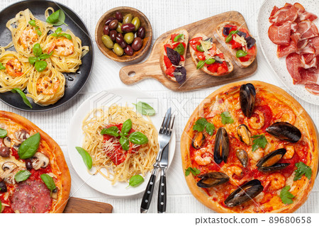 Italian cuisine. Pizza, pasta and toasts Italian cuisine. Pizza, pasta and toasts 89680658
