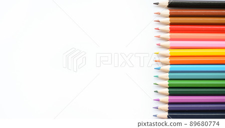 A set of colored pencils isolated on a white background in banner format. Place for text A set of colored pencils isolated on a white background in banner format. Place for text 89680774