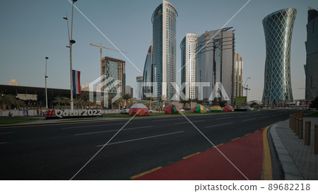 Qatar preparation for FIFA world cup 2022 with  the flags of the participating football teams displayed in Omar AL Mukhtar street in Doha, Qatar  daylight view 89682218