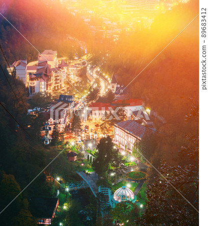 Borjomi, Samtskhe-Javakheti, Georgia. Aerial View Borjomi Cityscape And Central Park In Autumn October Evening Night In Night Illuminations Lights Lighting 89683412