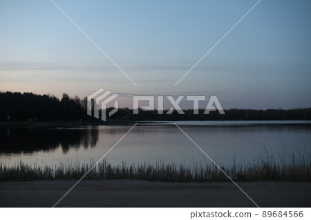 sunset at coast of the lake. Nature landscape. Landscape during sunset. 89684566