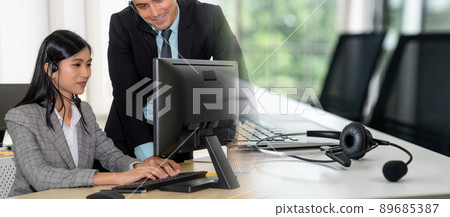 Business people wearing headset working in office broaden view 89685387