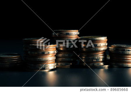 Pile of gold coins stack in finance treasury deposit bank account for saving Pile of gold coins stack in finance treasury deposit bank account for saving 89685668