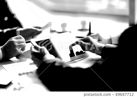 close up.the businessman uses a digital tablet for his work close up.the businessman uses a digital tablet for his work 89687712