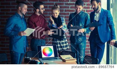 business team with documents being prepared to discuss the new a business team with documents being prepared to discuss the new a 89687764
