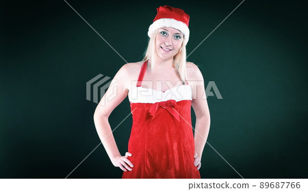 portrait of a young blonde woman dressed as Santa Claus portrait of a young blonde woman dressed as Santa Claus 89687766