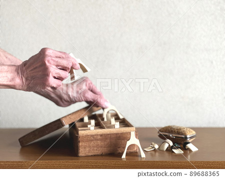 Koto tools and elderly hands Koto tools and elderly hands 89688365