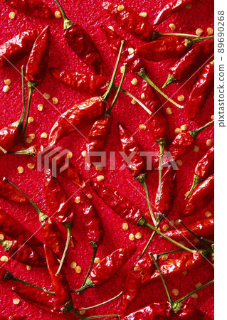 Hawk's claw chili red background 89690268