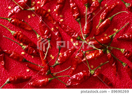 Hawk's claw chili red background 89690269