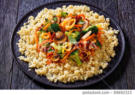 quinoa with fried veggies, mushrooms on plate quinoa with fried veggies, mushrooms on plate 89692323