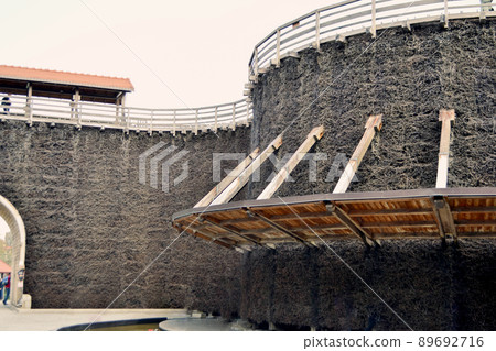 Graduation tower, great inhalatorium in the resort near Krakow. It is made of wood and sloe branches to increase the salt concentration in brine. High quality photo Graduation tower, great inhalatorium in the resort near Krakow. It is made of wood and sloe branches to increase the salt concentration in brine. High quality photo 89692716