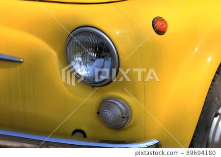 Image of a yellow Italian car 89694180