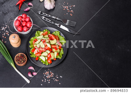 Lettuce, cucumber, spinach, tomato and quail eggs salad with herbs and lemon Lettuce, cucumber, spinach, tomato and quail eggs salad with herbs and lemon 89694833