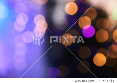 Dark purple background of blurred bokeh with warm colorful lights. With space to copy. High quality photo Dark purple background of blurred bokeh with warm colorful lights. With space to copy. High quality photo 89695213