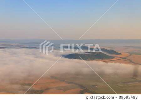 Aerial view of the mountains and fields in Bulgaria. View from a plane 89695488