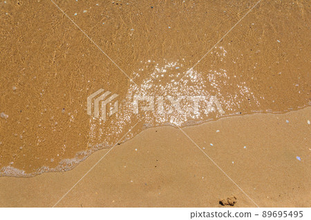 Soft wave of sea on sandy beach 89695495