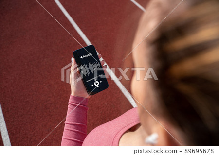 Sport music. Lifestyle workout exercise woman training. Female with headphones. Sport music and healthy lifestyle. Sport music. Lifestyle workout exercise woman training. Female with headphones. Sport music and healthy lifestyle. 89695678