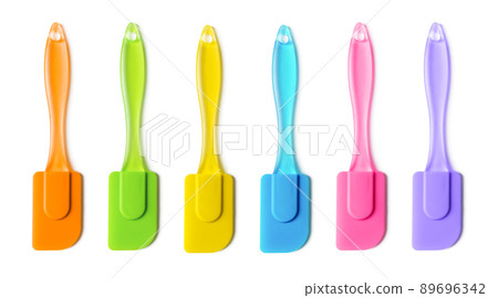 Multicolored silicone cooking spatula set isolated on white background. Multicolored silicone cooking spatula set isolated on white background. 89696342