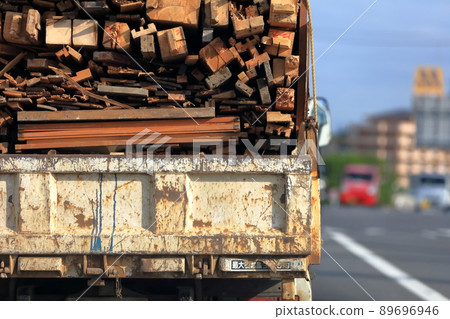 Image of a truck carrying waste materials 89696946