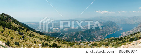 Beautiful nature mountains landscape. Kotor bay, Montenegro. Views of the Boka Bay, with the cities of Kotor and Tivat with the top of the mountain, Montenegro Beautiful nature mountains landscape. Kotor bay, Montenegro. Views of the Boka Bay, with the cities of Kotor and Tivat with the top of the mountain, Montenegro 89696974