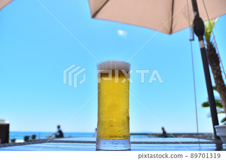 Draft beer on the beach side 89701319