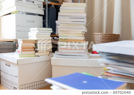 Stacked books, reading, moving, decluttering 89702040