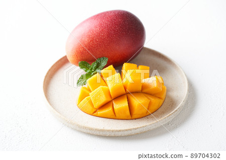 Domestic mango cut into a flower shape Domestic mango cut into a flower shape 89704302