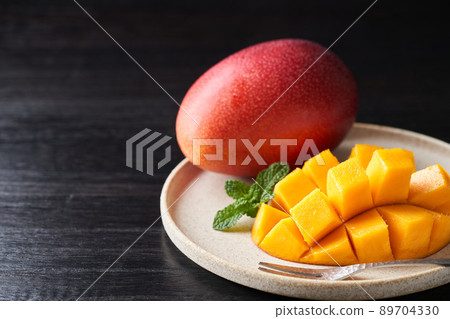Domestic mango cut into a flower shape 89704330