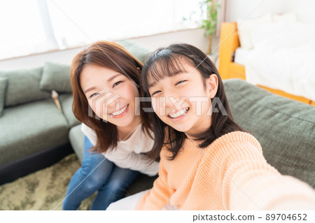 Self-filming parent and child Self-filming parent and child 89704652