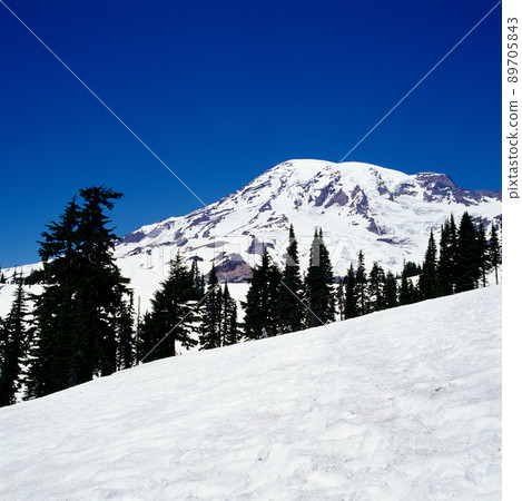 Snowy mountains and blue sky 89705843