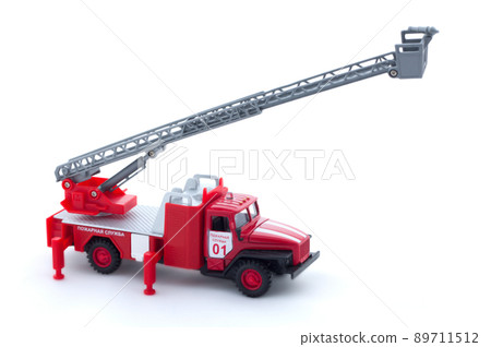 Toy fire truck on white background, isolated Toy fire truck on white background, isolated 89711512