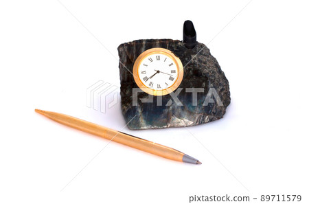 Table office set - stone stand with clock and pen on white background Table office set - stone stand with clock and pen on white background 89711579
