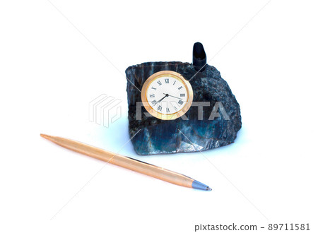 Table office set - stone stand with clock and pen on white background Table office set - stone stand with clock and pen on white background 89711581