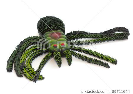 Spider toy on white background Spider toy on white background 89711644