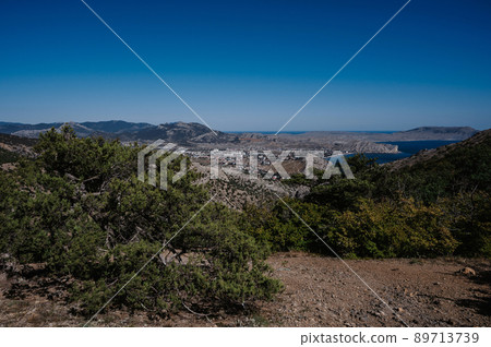 View of the ancient city of Sudak and the Genoese fortress on the Black Sea coast in Crimea 89713739
